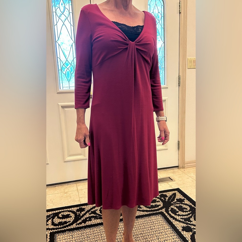 3/4 length sleeve dress. Comfy and wrinkle resistant (cami not included).